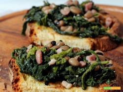 crostoni di pane di Matera con cime di rapa e fagioli di Sarconi
