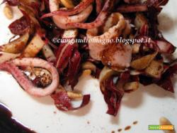 Insalata tiepida di calamari e radicchio con uvetta, pinoli e riduzione di balsamico
