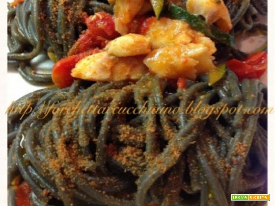 Spaghetti al nero di seppia con orata, zucchine e bottarga