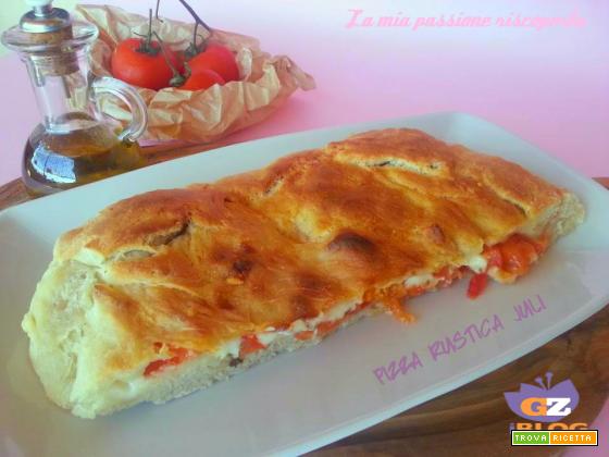 Pizza rustica, alici pomodori origano, sale olive nere, olio di oliva..