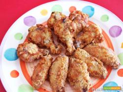 Ali di pollo fritte aromatizzate