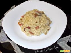 Risotto cremoso con speck e funghi