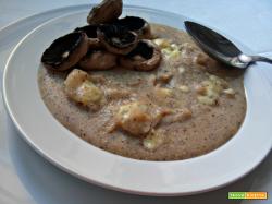 Polenta taragna con brie fuso e funghi