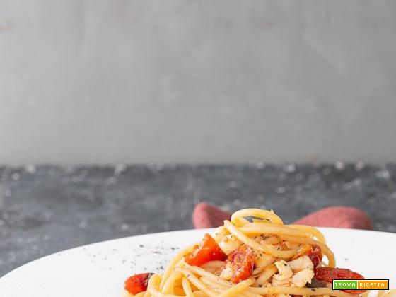 Spaghetti al ragù di cernia bianca con pomodori confit