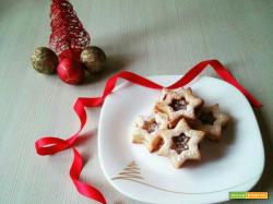 Biscotti stelle di Natale ripiene di Nutella