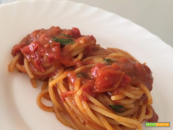 Spaghetti risottati con pomodorini e basilico