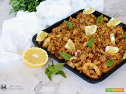 Calamari e gamberetti gratinati