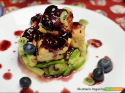Tofu con la salsa di mirtilli e zucchine