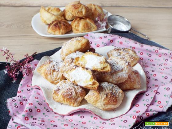 Bignè choux sfogliati con panna due impasti in un unico dolce, preparati cosi sono una vera delizia.